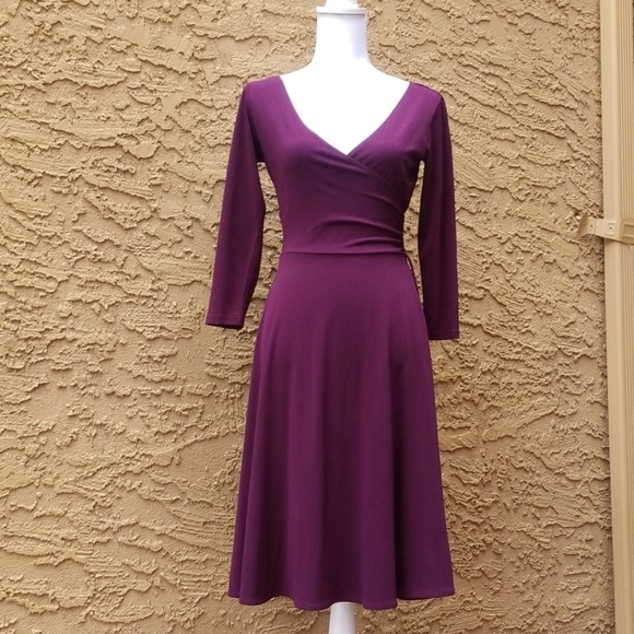 London Times Dresses & Skirts - COPY - London Times plunging neckline